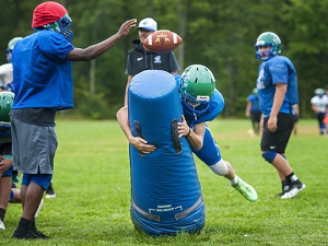 Colchester's Olson overcomes heart defect to shine on football field